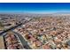 Aerial view of neighborhood, showing homes with red tile roofs at 445 Concord Way, Henderson, NV 89015