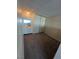 Carpeted bedroom with mirrored vanity and sliding closet doors at 4600 University Center Dr # 95, Las Vegas, NV 89119