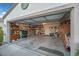 Attached garage with ample storage space and shelving at 4985 Mascaro Dr, Las Vegas, NV 89122