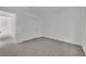 Spacious bedroom with double door closet and gray carpet at 5566 Erindale Terrace Ave, Las Vegas, NV 89141