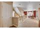 Upstairs hallway with neutral walls, carpet, and a linen closet at 6152 Sky River Ct, Las Vegas, NV 89118