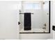 Modern bathroom with a bathtub, shower, and updated fixtures at 818 Meyer May St, Las Vegas, NV 89138