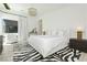 Spacious bedroom with a comfortable bed and stylish rug at 818 Meyer May St, Las Vegas, NV 89138