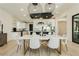 Elegant dining area with marble table and modern lighting at 818 Meyer May St, Las Vegas, NV 89138