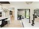 Kitchen dining area with view into a private courtyard at 818 Meyer May St, Las Vegas, NV 89138
