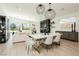 Elegant dining area with marble table and modern light fixtures at 818 Meyer May St, Las Vegas, NV 89138