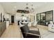 Modern kitchen with marble table and gold accents at 818 Meyer May St, Las Vegas, NV 89138