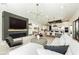 Open living area, fireplace, and kitchen view at 818 Meyer May St, Las Vegas, NV 89138
