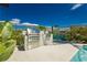 Modern outdoor kitchen with stainless steel grill and ample counter space at 818 Meyer May St, Las Vegas, NV 89138