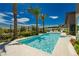 Modern rectangular pool with spa and lush landscaping at 818 Meyer May St, Las Vegas, NV 89138