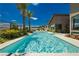 Relaxing pool with spa, lounge chairs, and palm trees at 818 Meyer May St, Las Vegas, NV 89138