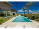 Stunning pool with a built-in spa and modern home at 818 Meyer May St, Las Vegas, NV 89138