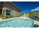 Enjoy this refreshing pool with built-in spa and outdoor kitchen at 818 Meyer May St, Las Vegas, NV 89138