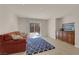 Living area with tile floors, couch, and built-ins at 8426 Blackstone Ridge Ct, Las Vegas, NV 89139