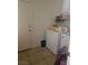 Laundry room with washer, dryer, and exterior access at 9007 Purple Leaf St, Las Vegas, NV 89123