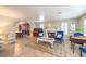 Living area with a view into the dining room and fireplace at 9304 Angelfish Dr, Las Vegas, NV 89117