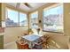 Cozy breakfast nook with a table and chairs, offering views of the mountains at 943 Woodacre Dr, Boulder City, NV 89005