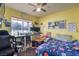 Bright bedroom with a workspace and a bed at 9640 Towngate Ave, Las Vegas, NV 89129