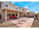 Covered patio with comfortable seating, a basketball hoop, and a hammock at 10529 Parthenon St, Las Vegas, NV 89183