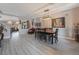 Dining area with hardwood floors and a stylish wooden dining table at 10529 Parthenon St, Las Vegas, NV 89183