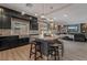 Spacious kitchen with island, stainless steel appliances, and granite countertops at 10529 Parthenon St, Las Vegas, NV 89183