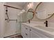 Modern bathroom with double vanity, walk-in shower, and elegant fixtures at 1067 Garden Cress Ct, Las Vegas, NV 89138