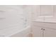 Clean bathroom with white vanity, bathtub, and shower at 10718 Glowing Dawn Ave, Las Vegas, NV 89135