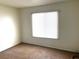 Simple bedroom with carpeted floors and window blinds at 118 Queenswreath Dr, North Las Vegas, NV 89031