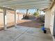 Covered patio provides shade and outdoor entertaining space at 118 Queenswreath Dr, North Las Vegas, NV 89031