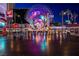 Night view of the Fremont Street Experience, with bright lights and crowds at 150 Las Vegas Blvd # 907, Las Vegas, NV 89101