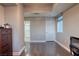 Spacious bedroom with hardwood floors and access to a bathroom at 150 Las Vegas Blvd # 907, Las Vegas, NV 89101