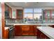 Modern kitchen with wood cabinets and city views at 150 Las Vegas Blvd # 907, Las Vegas, NV 89101