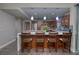 Modern kitchen with breakfast bar and pendant lighting at 150 Las Vegas Blvd # 907, Las Vegas, NV 89101