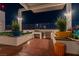 Rooftop outdoor kitchen with stainless steel appliances and seating area at 150 Las Vegas Blvd # 907, Las Vegas, NV 89101