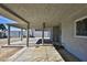 Covered patio and expansive backyard with concrete slab at 1605 Oakwood Ave, North Las Vegas, NV 89030