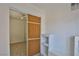 Spacious bedroom closet with built-in shelving at 1605 Oakwood Ave, North Las Vegas, NV 89030