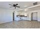 Bright kitchen with white cabinets and tile floor at 1605 Oakwood Ave, North Las Vegas, NV 89030