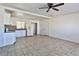 Bright kitchen with white cabinets and tile floor at 1605 Oakwood Ave, North Las Vegas, NV 89030