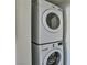 Stackable LG washer and dryer in convenient laundry closet at 1605 Oakwood Ave, North Las Vegas, NV 89030