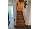 Staircase with wood-look laminate flooring at 2180 Palora Ave, Las Vegas, NV 89169