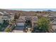 Aerial view of house with tile roof and desert landscape at 2261 Boutique Ave, Henderson, NV 89044