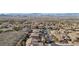 Aerial view of homes in a community nestled against a mountain backdrop at 2261 Boutique Ave, Henderson, NV 89044