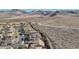 Aerial view of homes in a community with desert landscape in the background at 2261 Boutique Ave, Henderson, NV 89044