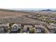 Aerial view showing multiple houses and desert landscape at 2261 Boutique Ave, Henderson, NV 89044