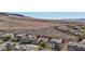 Aerial view of houses and desert landscape at 2261 Boutique Ave, Henderson, NV 89044