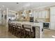 Modern kitchen with large island, stainless steel appliances, and ample counter space at 2261 Boutique Ave, Henderson, NV 89044