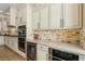 Spacious kitchen with stainless steel appliances and custom cabinetry at 2261 Boutique Ave, Henderson, NV 89044