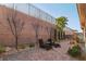 Relaxing patio area with comfortable seating and brick pavers at 2261 Boutique Ave, Henderson, NV 89044