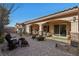 Outdoor patio with seating area and access to the house at 2261 Boutique Ave, Henderson, NV 89044