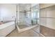 Modern bathroom with soaking tub and walk-in shower at 2374 Thayer Ave, Henderson, NV 89074